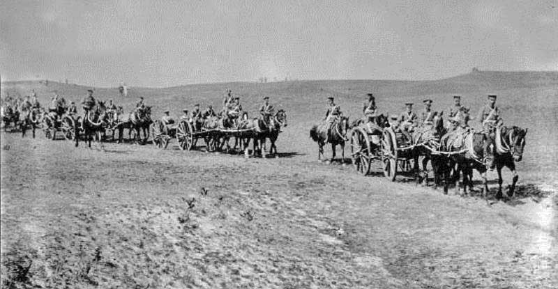 Gun carriages exercising on sand dunes
