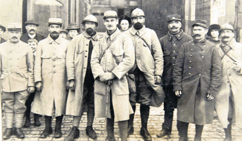 A group of French soldiers returning to the Island on leave in December 1915 - the central figure is Sergeant J. Bastide of Longueville.
