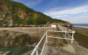 The remains of the pier today. What was left of the inner wall has been demolished and a slipway built up against the stub of the outer wall