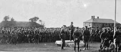 The Bailiff, William Vernon, appeals for volunteers from the Militia in October 1915 at St Peter’s Barracks while the Lieutenant Governor and other senior officers look on. ‘Grand Recruiting Rallies’ such as this were taking place across the Island at the time. . . with only limited success.