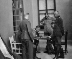 German officers play chess outside their Hougue Bie accommodation