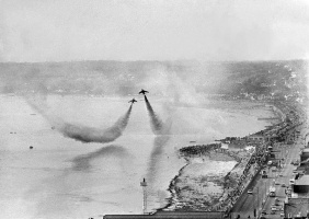 Red Arrows swoop low over the beach