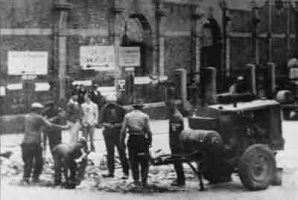 Todt workers laying a railway line at St Helier Harbour