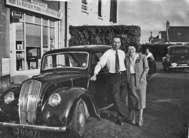 An unidentified car parked outside La Rocque Stores