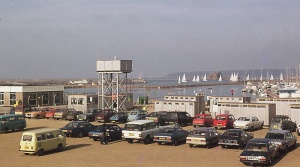 Cars parked on reclaimed land in the 1970s