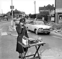 Police use radio to help control traffic during major JEC works in 1964