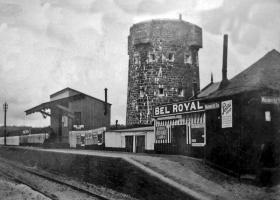 The tower stood behind the railway station