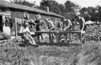 Soldiers cleaning their equipment