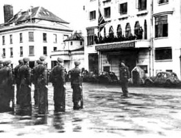 Outside the Pomme d'Or Hotel