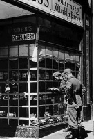 Germans shopped freely when they arrived but were soon controlled as stocks dwindled