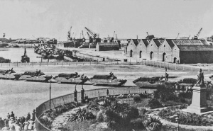 DUKW landing craft cross the Weighbridge after landing in the Victoria Harbour