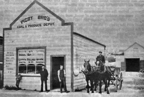 The Picot family business in Wellington. John Lionel Picot is standing in the doorway in shirt sleeves