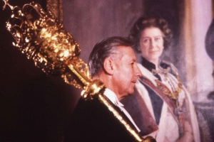 Philip Misson carrying the official Mace of the Royal Court and States