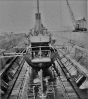 Minesweeper in dry dock at St Malo