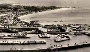 An aerial view of the harbour looking east over the St Clement coast. Most harbour views are shown in the opposite direction, taken from a somewhat lower viewpoint on Fort Regent