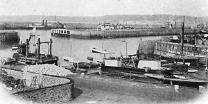 A stone crushing rig (left) in the French Harbour