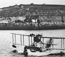 A seaplane manoeuvres in St Helier Harbour