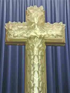 The cross above the alter