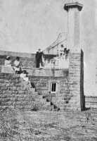 A family group at the end of the breakwater in the 1930s