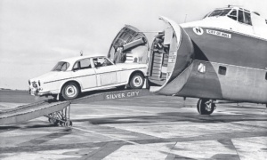 A Volvo being loaded on to a Superfreighter in 1962, on its way to compete in the Monte Carlo Rally