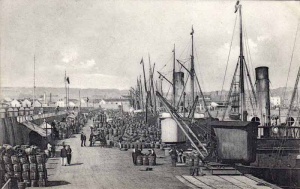 The Albert Pier full of potato barrels ready for export