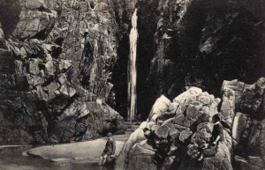 Boys inside the main cave at Plémont