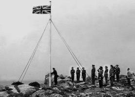 ... and another in 1945. The Union Flag is raised to assert Jersey's ownership of the reef