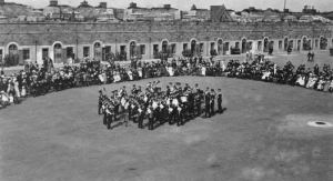 A band performs on the parade ground in 1900