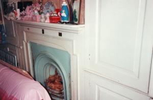 A Victorian insert in a Georgian fireplace