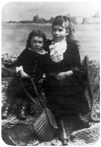 Florence Mary and Lilian Jane de Gruchy (late John Huelin, St Mary) with Elizabeth Castle in the background in 1890