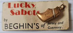 A promotional sabot brooch