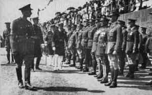 The King inspects a guard of honour on the Albert Pier