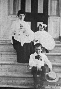 We have yet to identify this mother and her three young children, photographed in Canada