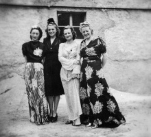 Four women dressed up for the concert