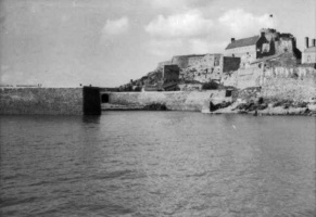 The castle's small harbour from the sea