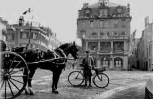 Edwardian modes of transport with the Royal Yacht Hotel in the background