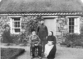An old fisherman with his wife and son. It is not known if this photograph was taken in Jersey or France
