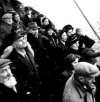 Returning islanders approach Alderney's harbour