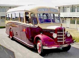 A restored vintage coach put back into service by Tantivy