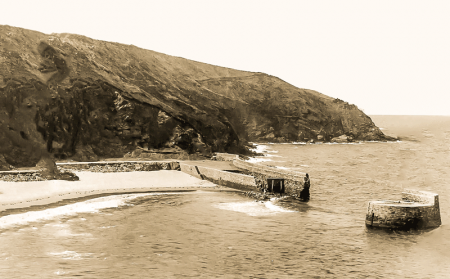 The pierhead repaired but a major breach has opened behind it