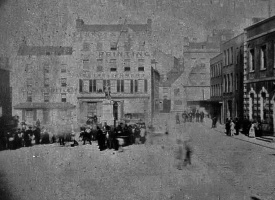 This poor-quality image was taken in 1861 when a small crowd gathered outside the States Building to celebrate the overturning of a UK Government decision that Jersey should be represented in Parliament
