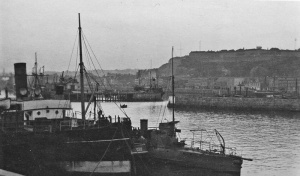 A naval vessel in the harbour