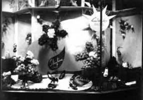 Beghin's King Street shop window in 1953 promoting the Battle of Flowers