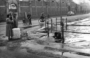 On a very high spring tide water washes over the top of the Albert Pier