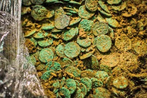 The coins are held together by heavy clay and stuck to each other