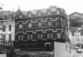 Amy's gentleman's outfitters on the corner with Queen Street being demolished prior to rebuilding