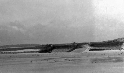 Les Brayes viewed from the sea. Manned by three NCOs and 12 men, this was one of the main defences of the southern end and centre of the bay