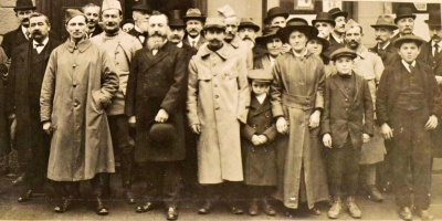 At a ceremony held on New Year’s Day at the French Consulate, Monsieur Jouve, the Consul, awarded a Medaille Militaire to Corporal Jerome Durand of the French 94th Infantry Regiment, standing to the Consul’s right in this picture with his hand in his pocket. Corporal Durand, whose family lived at Hampshire Gardens in Aquila Road, St Helier, had lost his left hand in the war.
