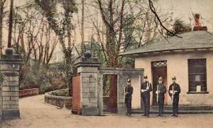 A tinted postcard of the entry guard