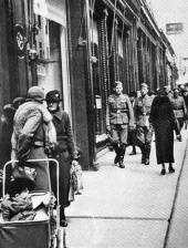 Off-duty German soldiers in a busy Queen Street